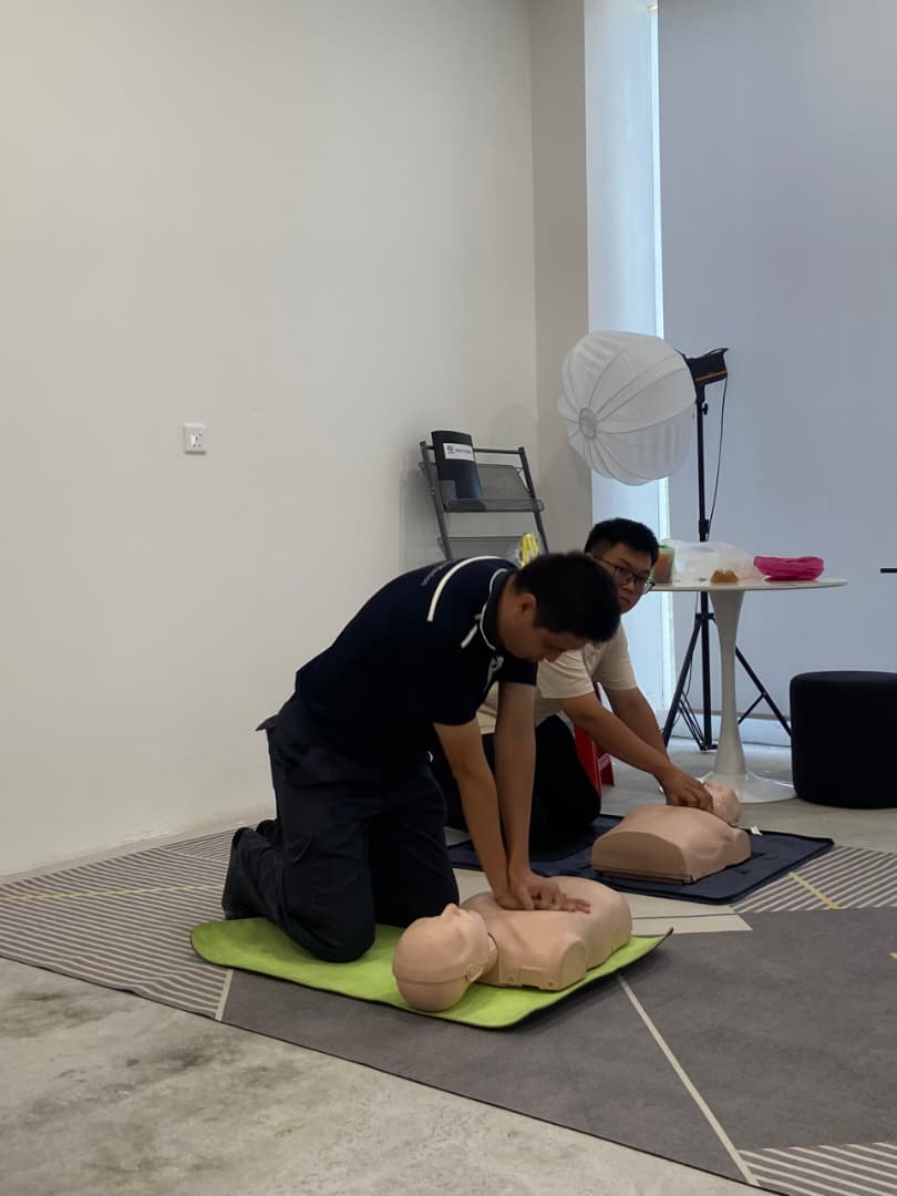 ORIZI Group employees practising CPR and first aid