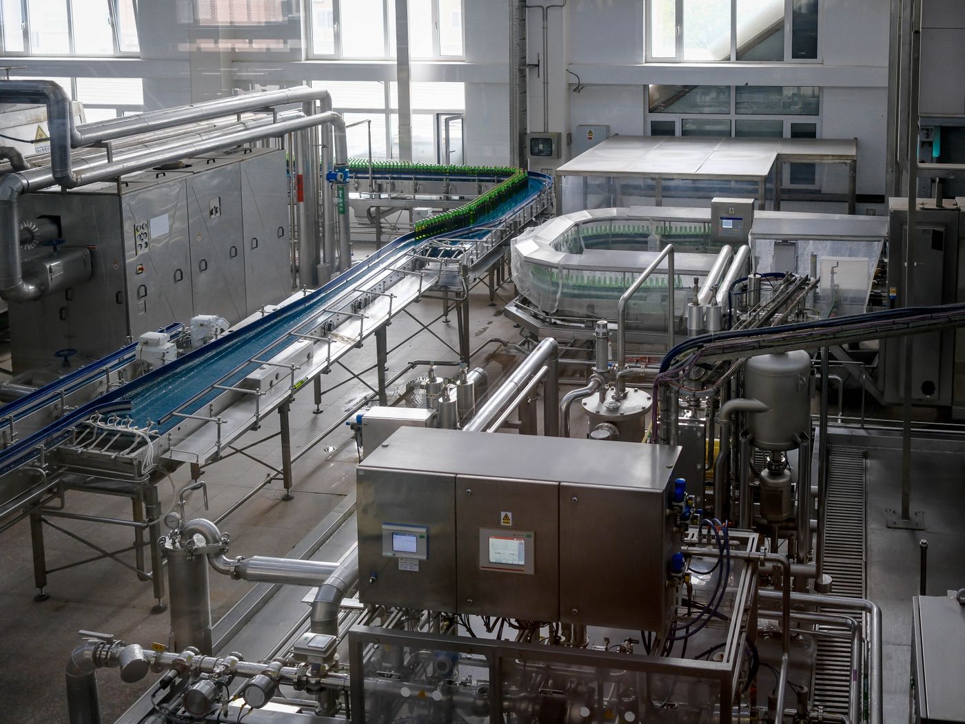 Automated bottling production line inside a manufacturing plant
