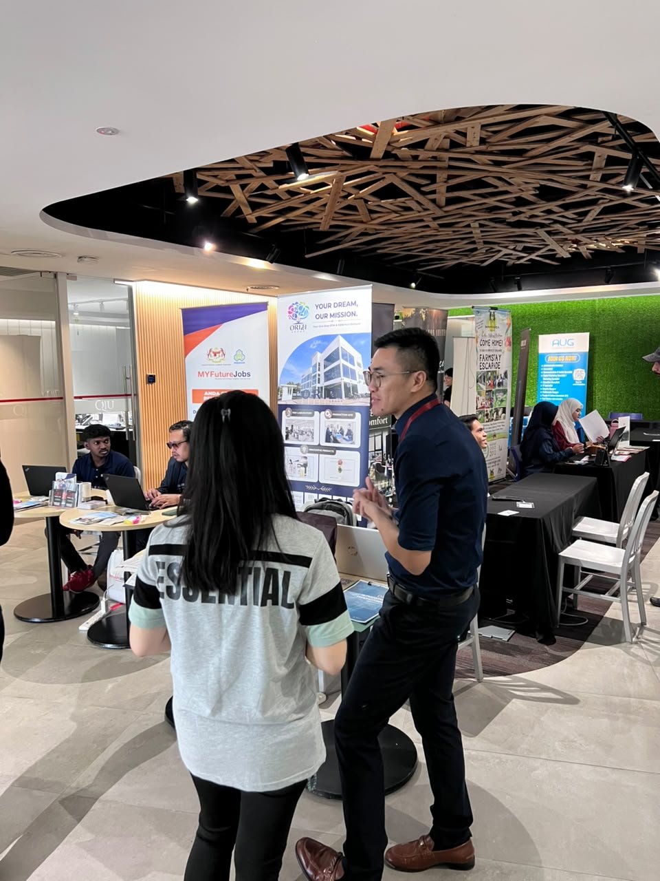 ORIZI Group booth with Your Dream Our Mission standee at QIU Industry Day 2026